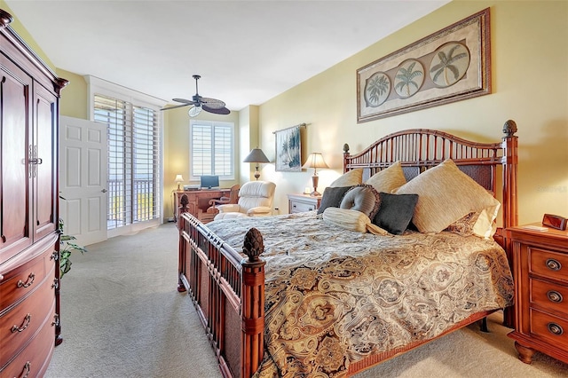 bedroom featuring light carpet and ceiling fan