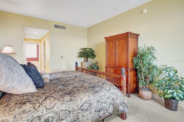 bedroom with light carpet