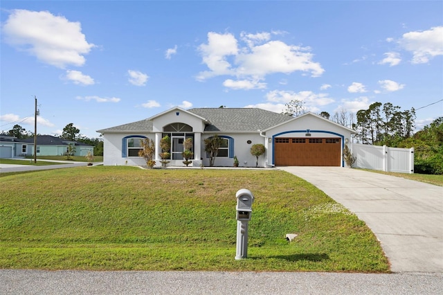 ranch-style home with a front yard and a garage