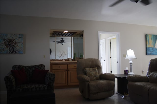 living room with ceiling fan