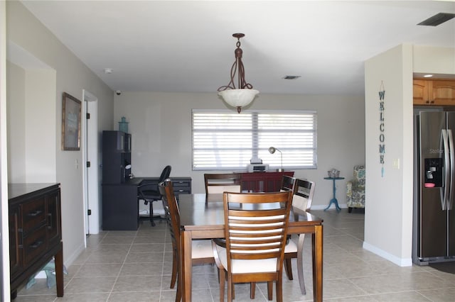 view of tiled dining space