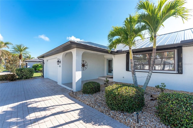 view of front of house with a garage