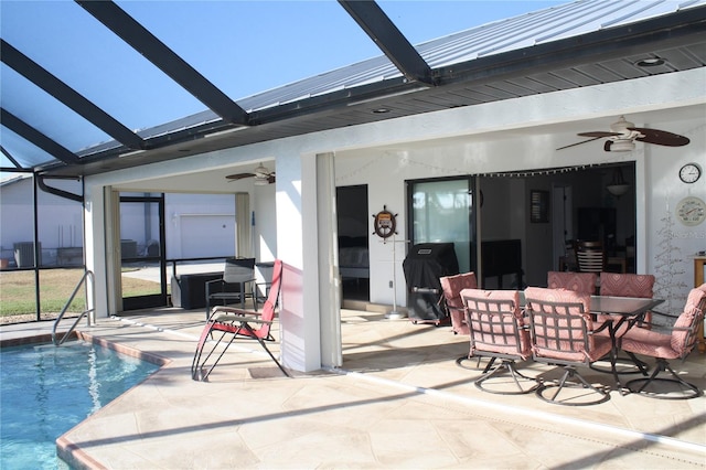 exterior space with ceiling fan and a lanai