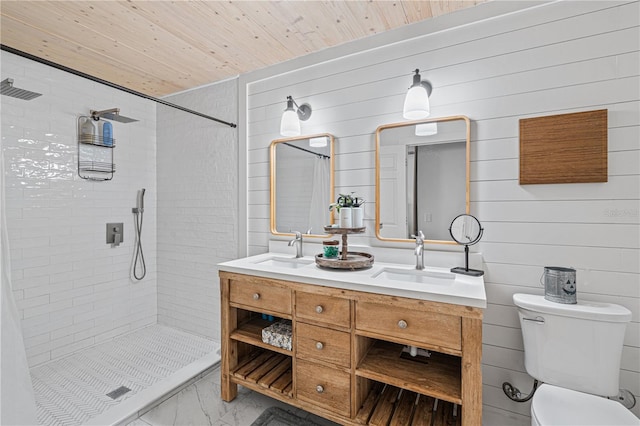 bathroom featuring tiled shower, toilet, wood walls, and wood ceiling