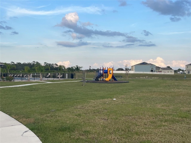1984 Golden Beak Dr, Eagle Lake, FL 33839 - community jungle gym with a lawn