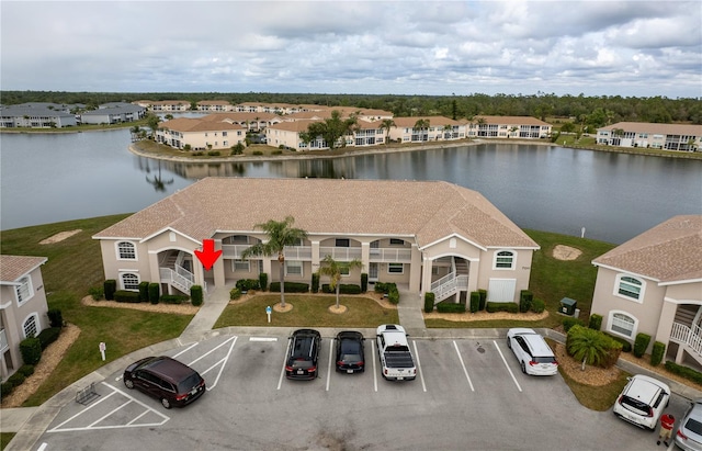 drone / aerial view featuring a water view