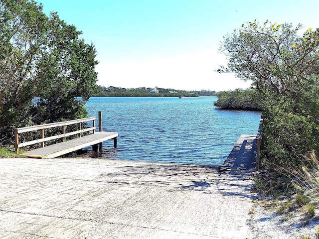 view of dock with a water view