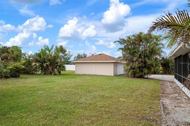 view of yard with a sunroom