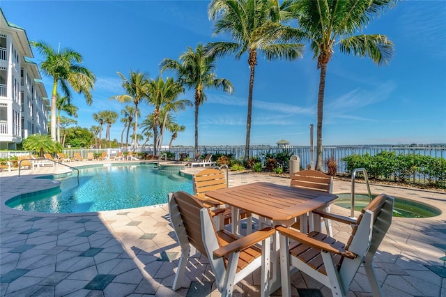 view of swimming pool with a patio