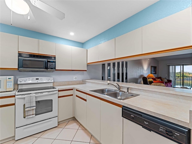 kitchen with ceiling fan, white cabinetry, white appliances, and sink