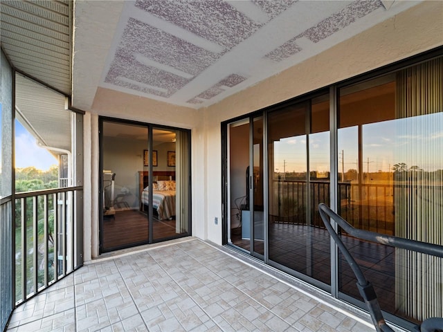 view of balcony at dusk