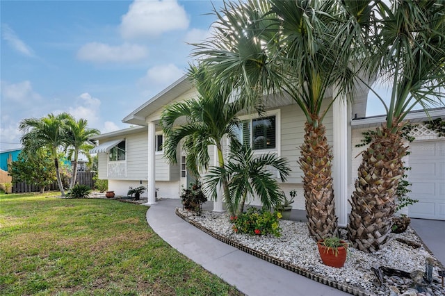 view of front facade with a front lawn