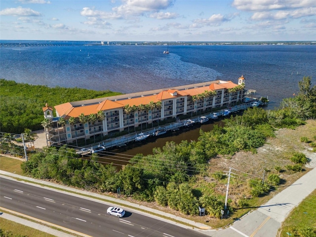 birds eye view of property featuring a water view