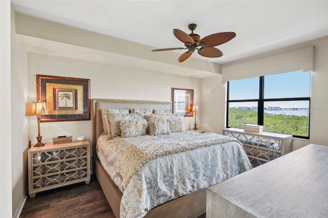 bedroom featuring ceiling fan and dark hardwood / wood-style flooring