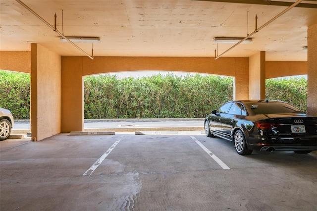 garage featuring a carport