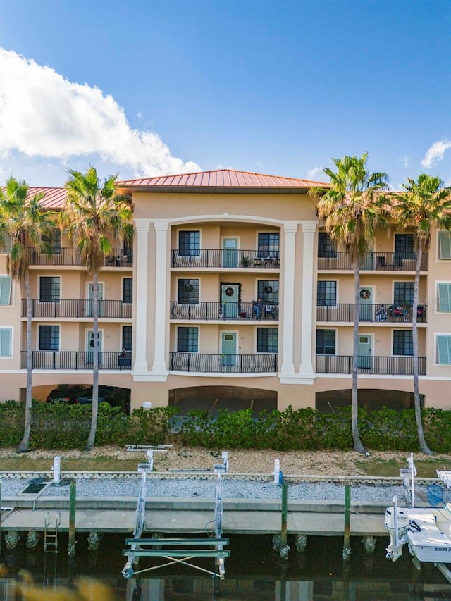 view of property with a water view