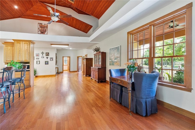 dining room with light hardwood / wood-style flooring, high vaulted ceiling, ceiling fan, and wood ceiling