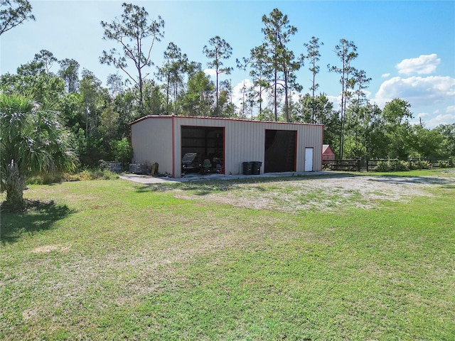 view of outbuilding with a lawn