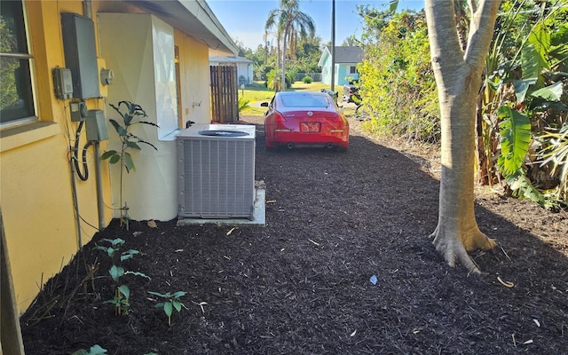 view of yard featuring central AC unit