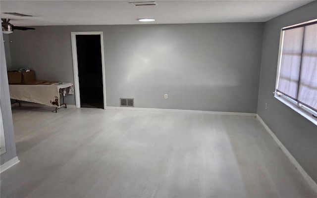 1108 Ample Ave, Port Charlotte, FL 33948 - spare room with wood finished floors and baseboards