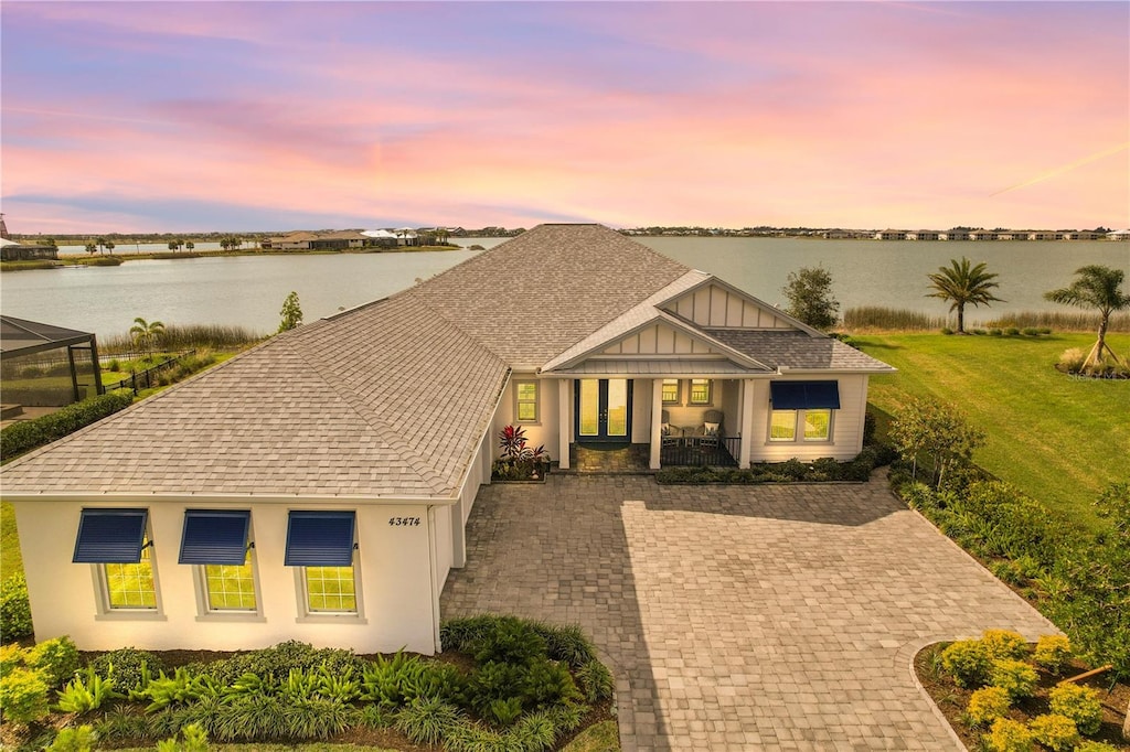 view of front of home featuring a water view