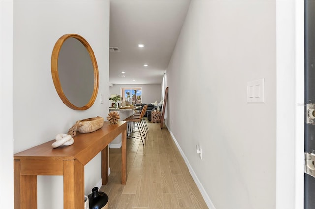 hallway featuring light wood-type flooring