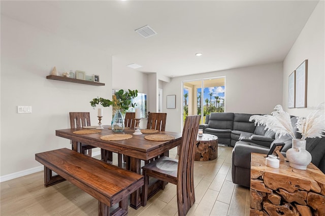 dining room with light wood-type flooring