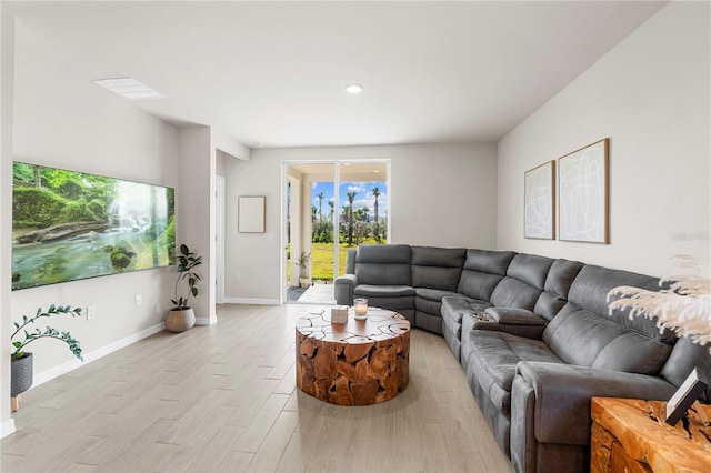 living room with light hardwood / wood-style floors