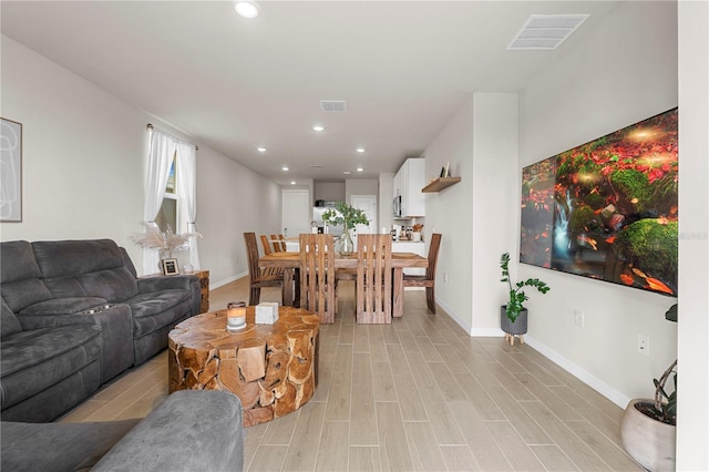 living room featuring light hardwood / wood-style flooring