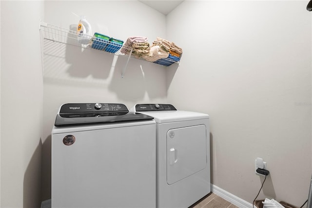 laundry room featuring washing machine and dryer