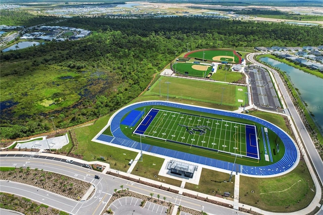 birds eye view of property with a water view