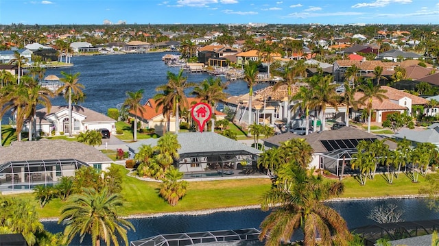 drone / aerial view with a water view