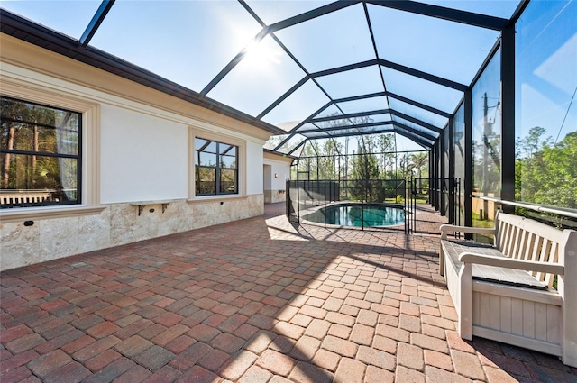 view of pool featuring a lanai and a patio area