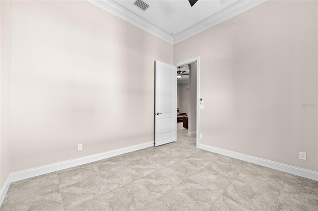 unfurnished room with ornamental molding