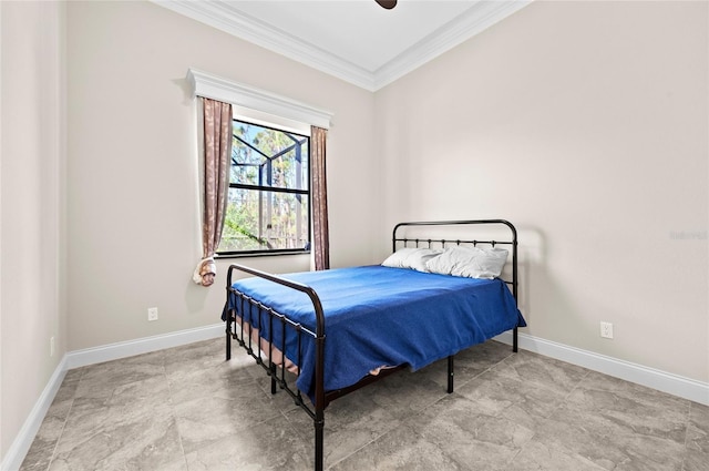 bedroom with ceiling fan and crown molding