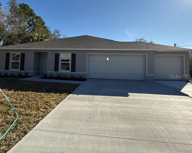 32 Luther Dr, Palm Coast, FL 32137 - single story home featuring a garage