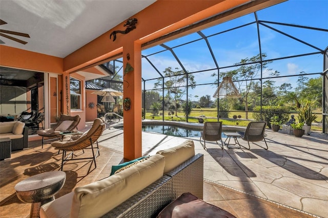 view of patio / terrace featuring glass enclosure, an outdoor living space, and ceiling fan