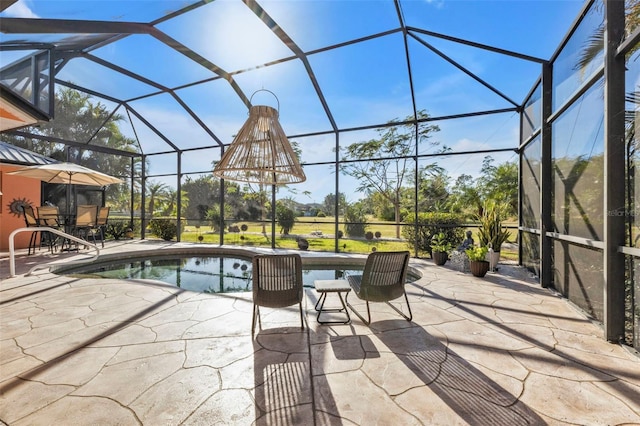 view of patio with a lanai