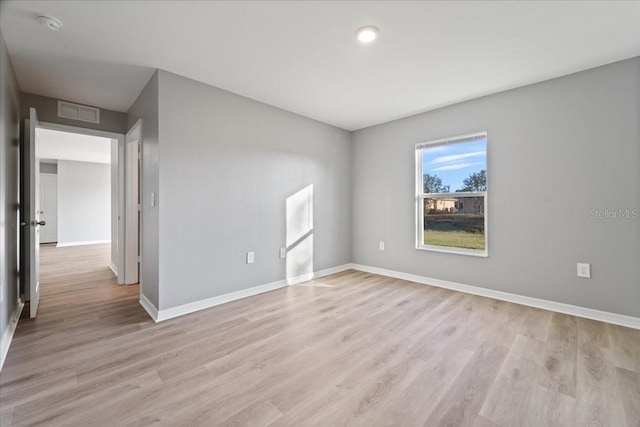 empty room featuring light hardwood / wood-style floors