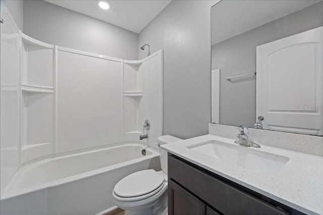 full bathroom with shower / tub combination, vanity, and toilet