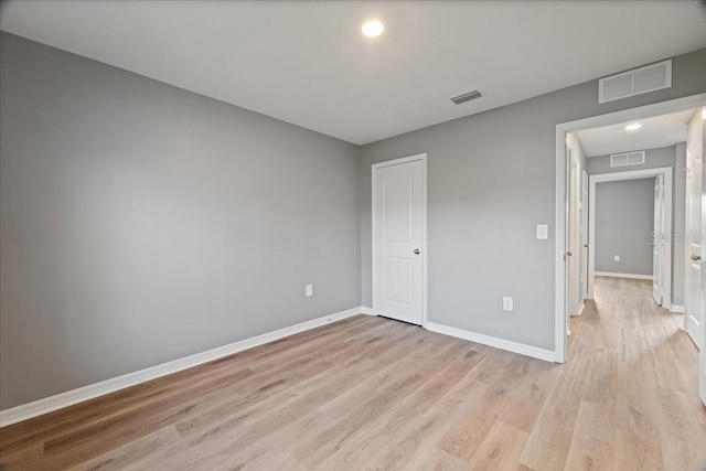 unfurnished bedroom with light hardwood / wood-style flooring