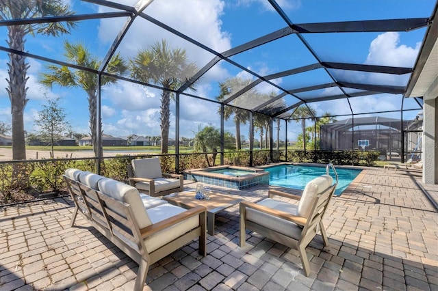 view of swimming pool featuring glass enclosure, an in ground hot tub, and a patio