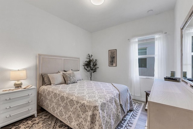 bedroom with light wood-type flooring