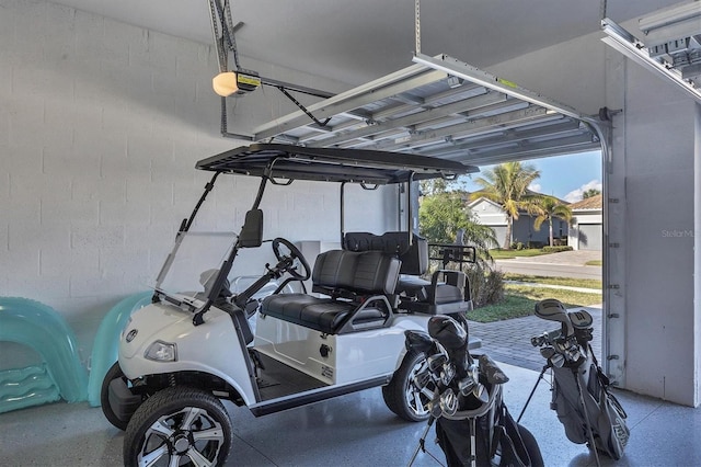 garage featuring a garage door opener