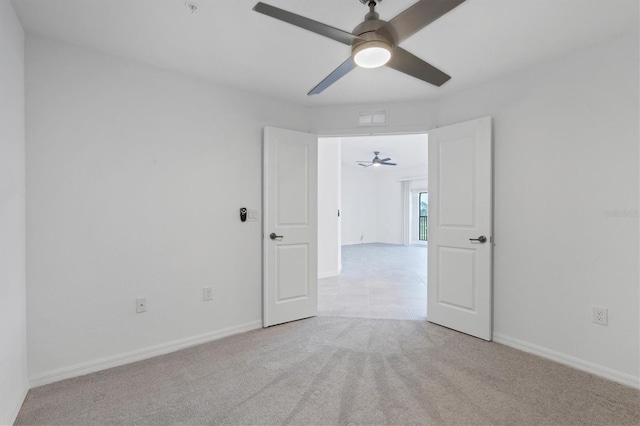 12470 Wellen Golf St Unit 203, Venice, FL 34293 - unfurnished room featuring ceiling fan and light carpet