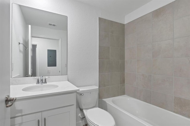 12470 Wellen Golf St Unit 203, Venice, FL 34293 - full bathroom with tiled shower / bath combo, vanity, toilet, and electric panel