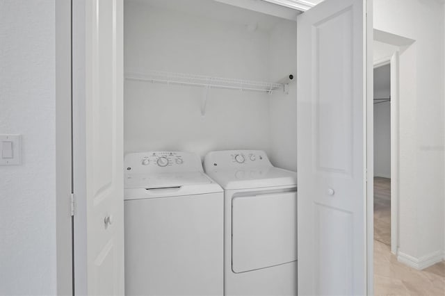 12470 Wellen Golf St Unit 203, Venice, FL 34293 - laundry room featuring separate washer and dryer