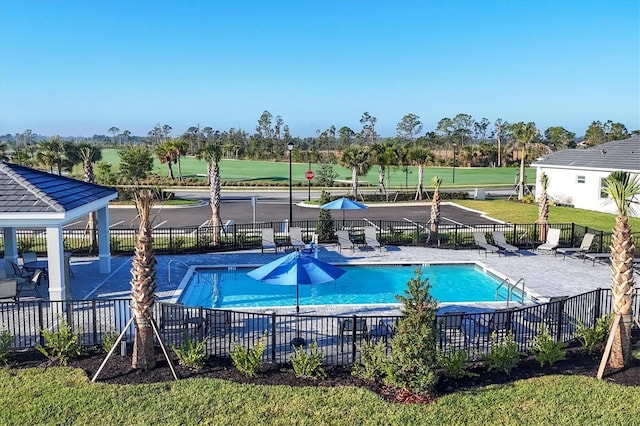 12470 Wellen Golf St Unit 203, Venice, FL 34293 - view of swimming pool with a patio area