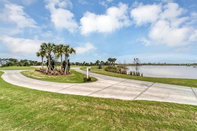 12470 Wellen Golf St Unit 203, Venice, FL 34293 - surrounding community featuring a water view and a yard