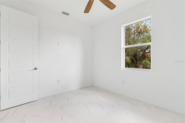 unfurnished room featuring ceiling fan